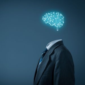 Artificial intelligence (AI), data mining, expert system software, genetic programming, machine learning, deep learning, neural networks and another modern computer technologies concepts. Brain representing artificial intelligence with printed circuit board (PCB) design.