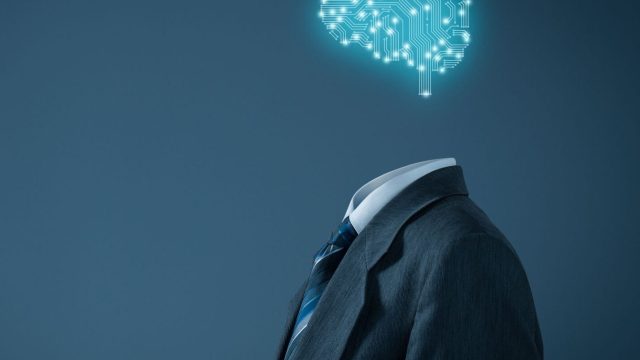 Artificial intelligence (AI), data mining, expert system software, genetic programming, machine learning, deep learning, neural networks and another modern computer technologies concepts. Brain representing artificial intelligence with printed circuit board (PCB) design.